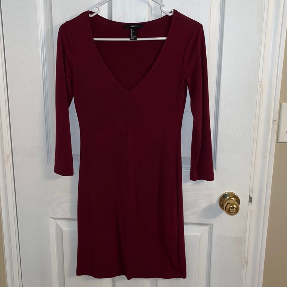 Selling v-neck long sleeve burgundy dress in good condition